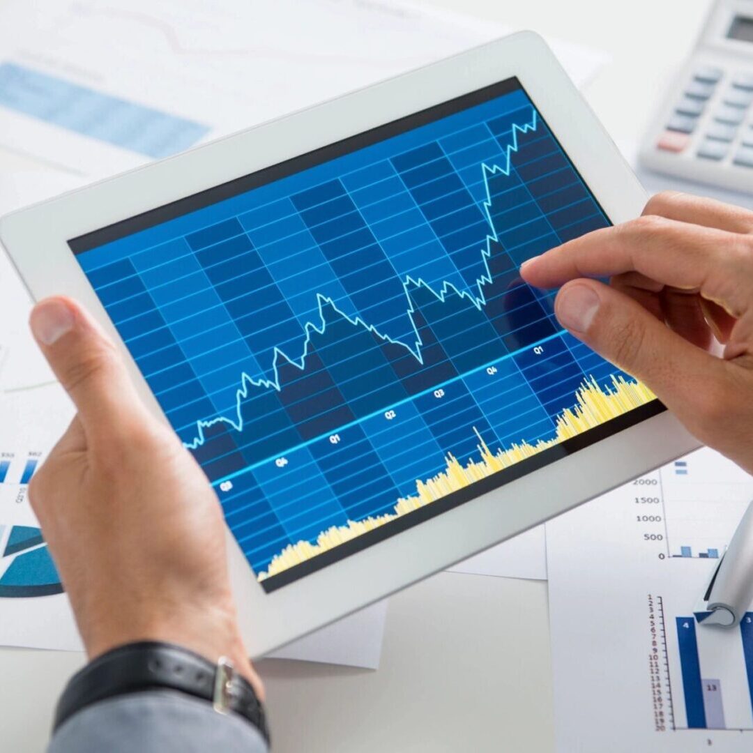 fm=f_242 A person holding an ipad with a chart on it.